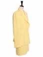 Tailleur veste double boutonnière et jupe en tweed de laine jaune soleil Prix boutique 2290€ Taille 36