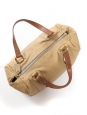 Beige leather duffle bag with burgundy stones and brown handles Retail price $1800