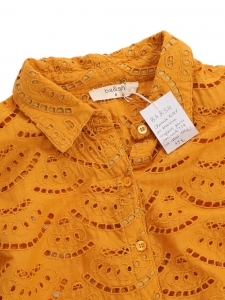 Long-sleeved shirt in orange-yellow eyelet lace