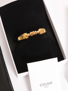 Gold tone sculpted brass cuff bracelet Retail price €560