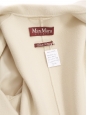 Classic wool coat in creamy white Retail price €950 Size 36