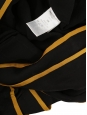 Long-sleeved round-neck top in black silk with yellow stripes and gold buttons Retail price €1500 Size 36