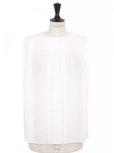 Blouse sans manche col rond en voile de coton blanc plissé Prix boutique 900€ Taille 38