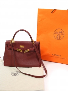 Sac à main KELLY 32 en cuir Clémence torillon bordeaux fermoir doré