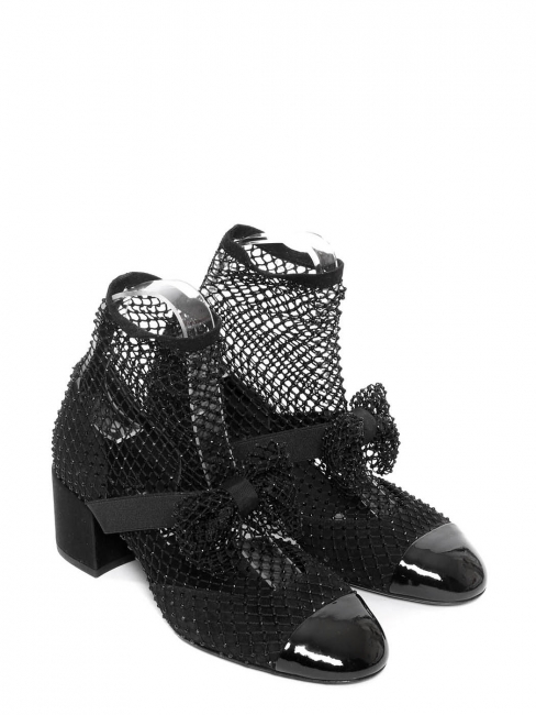 Bottines en résille noir détail noeud Spring 2023 Prix boutique 2000€ Taille 38
