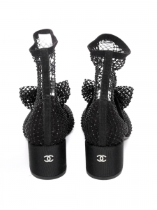 Bottines en résille noir détail noeud Spring 2023 Prix boutique 2000€ Taille 38