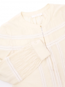 Blouse manches longues en soie beige et broderie dentelle blanche Prix boutique 1100€ Taille 36/38