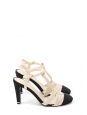 T-bar pumps in cream white leather with black grosgrain and pearl CC logo Retail price €1,200 Size 38