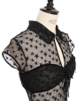 Black knit top with short sleeves, embroidered stars, velvet trim, and CC buttons Fall Winter Retail price €8,500 Size 36