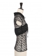 Black knit top with short sleeves, embroidered stars, velvet trim, and CC buttons Fall Winter Retail price €8,500 Size 36