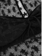 Black knit top with short sleeves, embroidered stars, velvet trim, and CC buttons Fall Winter Retail price €8,500 Size 36