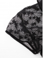 Black knit top with short sleeves, embroidered stars, velvet trim, and CC buttons Fall Winter Retail price €8,500 Size 36