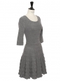 Fit and flare dress with 3/4 sleeves in 100% light gray wool. Retail price €4,400. Size 36.