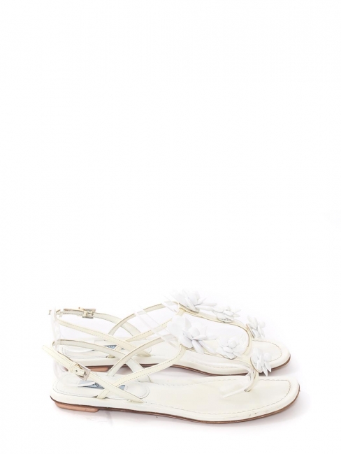 White patent leather flat sandals decorated with acetate flowers Retail price €800 Size 38