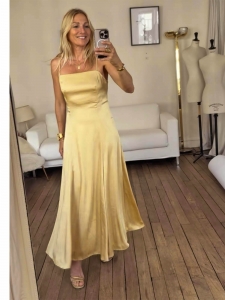 Pastel yellow satin long dress with thin straps Retail price €445 Size XS