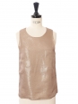 Top sans manche en soie rosé à pois doré  Prix boutique 1400€ Taille 34