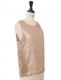 Top sans manche en soie rosé à pois doré  Prix boutique 1400€ Taille 34