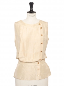 Cream white silk sleeveless top with gold jewelry button Retail price 1200&euro; Size XS