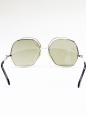 Silver frame sunglasses with a grey green gradient lens