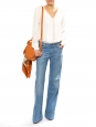 Light blue denim flared jeans Retail price €200 Size M