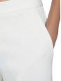 Pantalon évasé BEDFORD en crêpe blanc ivoire Prix boutique $560 Taille 38