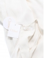 Robe mi-longue sans manches col rond en crêpe blanc Prix boutique 1100€ Taille 38