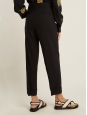 Pantalon à pli en laine noire Prix boutique 650€ Taille 40