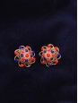 Gold brass flower clip earrings with red and blue studs