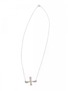 Thin silver chain necklace with winged Indian pendant