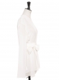 White silk long sleeves round neck blouse belted with a bow Retail price €770 Size 36 to 38