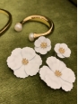 White petal flowers with gold hearts pierced ear earrings