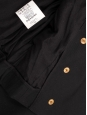 Black wool crêpe cropped jacket with vinyl collar Retail price €3000 Size 34
