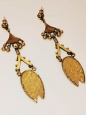 Boucles d'oreilles pendante ethnique en laiton doré Prix boutique 350€